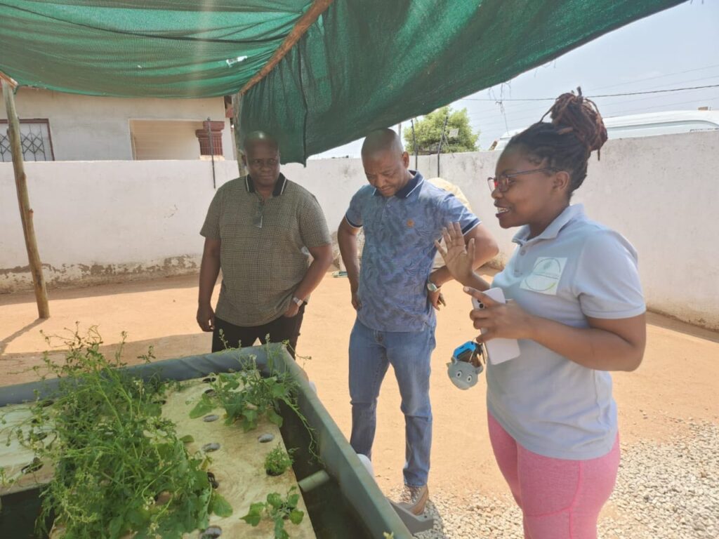 Thato Wesi, 31, founder of carbon capture business Wesmop with her employees
